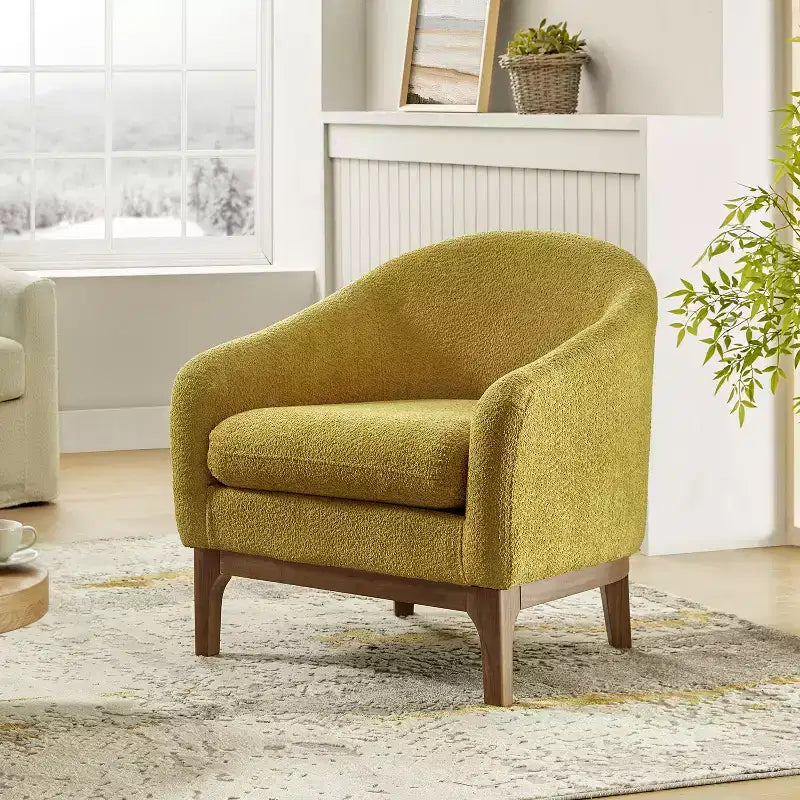 Poltrona Kiian Boucle con gambe in legno massello | HULALA HOME