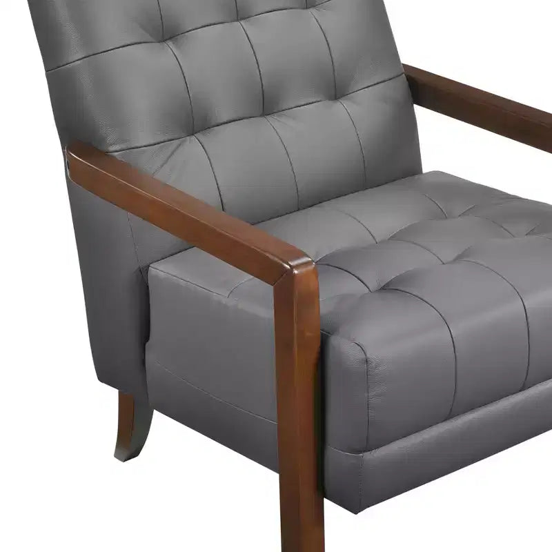Poltrona Okak Comfy in pelle con accenti, poltrona da salotto contemporanea con cuscino trapuntato imbottito, poltrona in legno con finitura noce