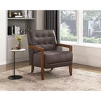 Poltrona Okak Comfy in pelle con accenti, poltrona da salotto contemporanea con cuscino trapuntato imbottito, poltrona in legno con finitura noce