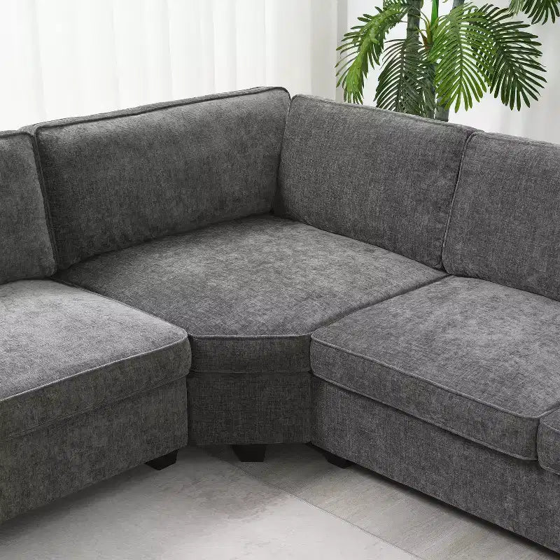 Divano sezionale a U a 6 posti in ciniglia Polibi con chaise longue oversize