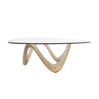 Olivia & May Cement Abstract Coffee Table with Abstract Wavy Base and Triangular Glass Top Beige