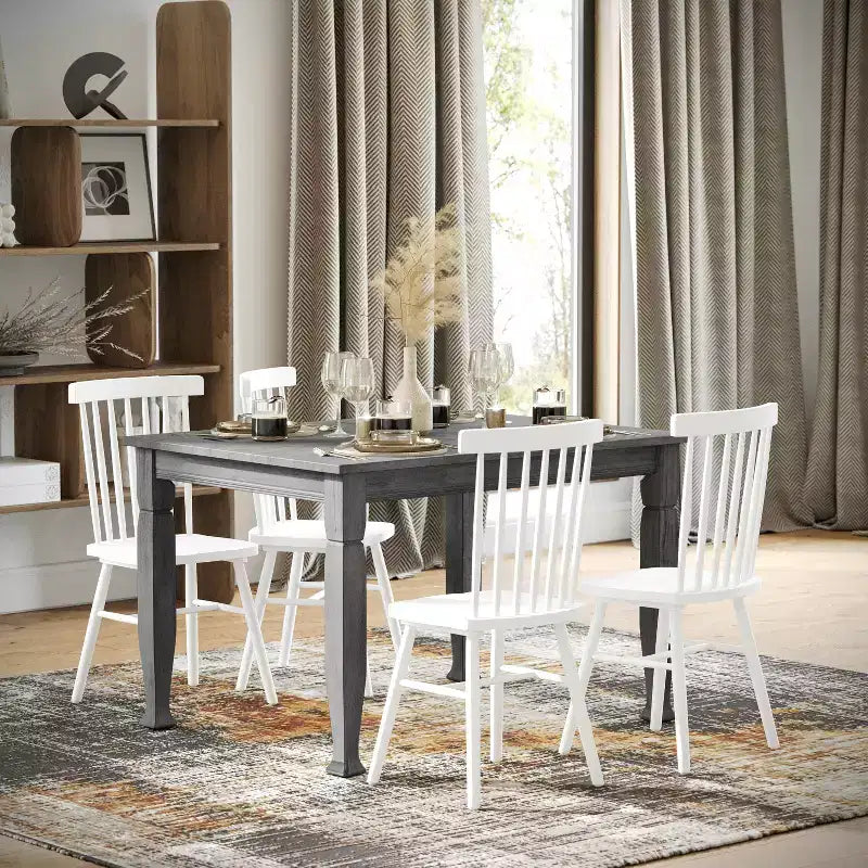Tavolo da pranzo in legno Merrick Lane con gambe scolpite