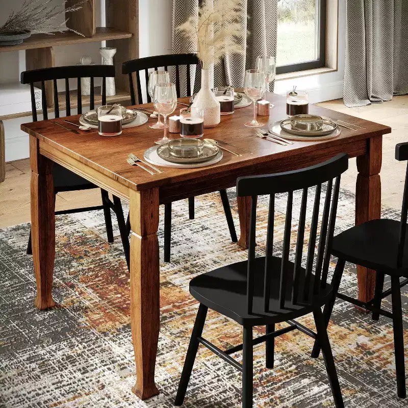 Tavolo da pranzo in legno Merrick Lane con gambe scolpite