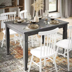 Tavolo da pranzo in legno Merrick Lane con gambe scolpite