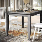 Tavolo da pranzo in legno Merrick Lane con gambe scolpite
