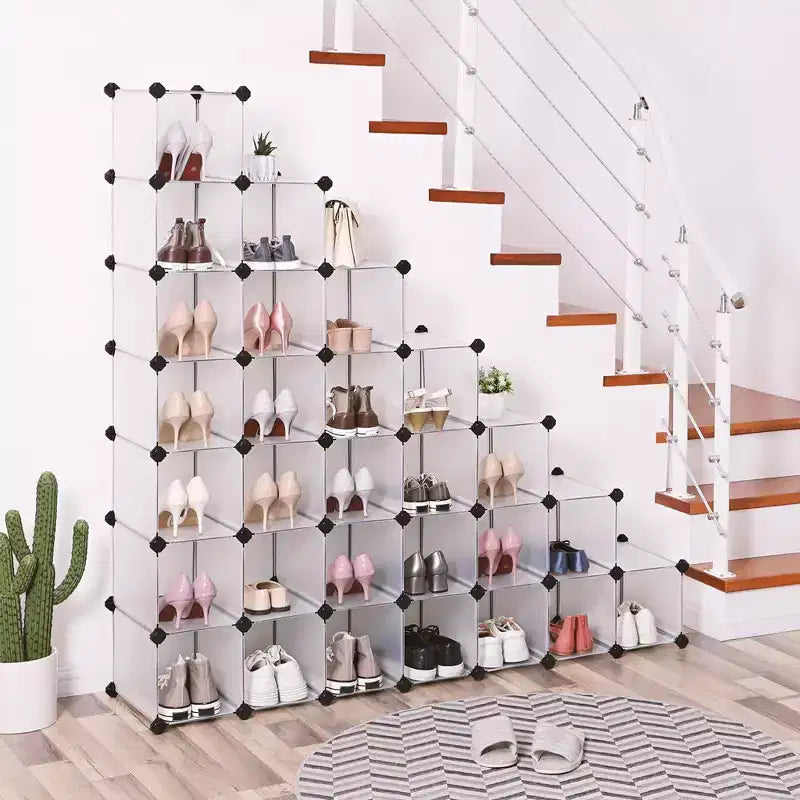SONGMICS Shoe Rack - Space-Saving 28-Slot Plastic Shoe Storage Organizer Transparent