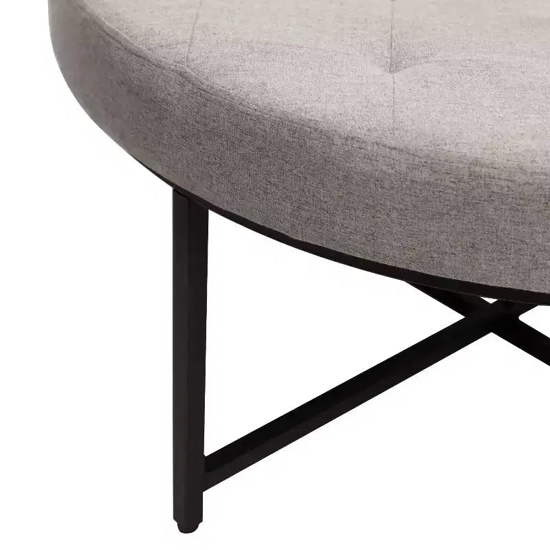 Emma and Oliver 34 in. Cotton Linen Round Ottoman with Tufted Design and Sturdy Iron Frame