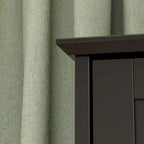 Comò nero a 5 cassetti con gambe in legno