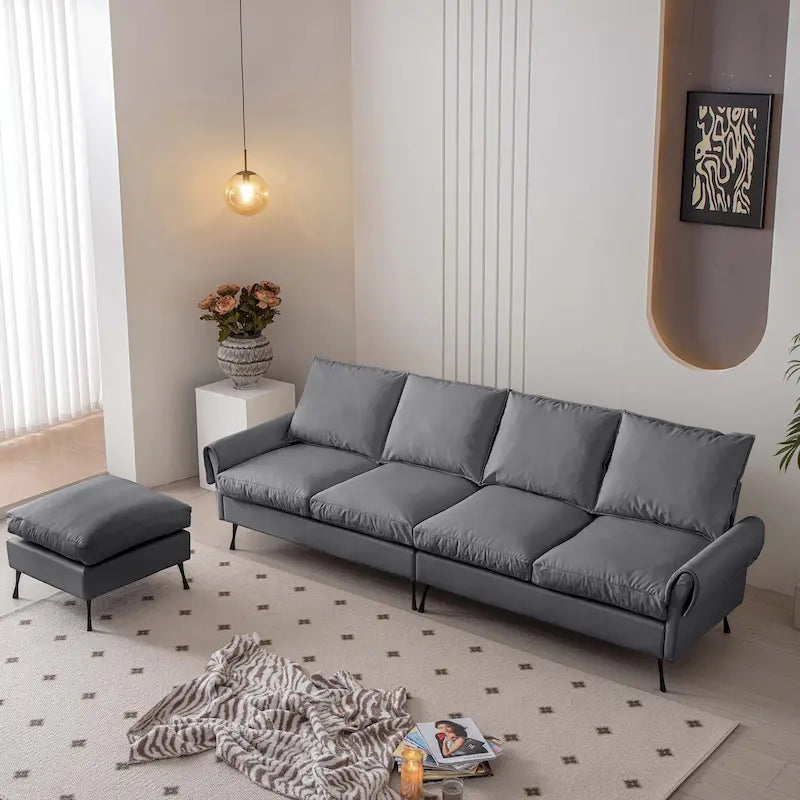 Divano a L tecnico moderno con pouf in pelle 104,5