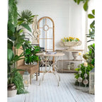 Round Wooden Table with Metal Scrollwork Legs