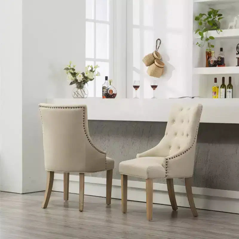 Roundhill Furniture Button Tufted Solid Wood Wingback Hostess Chairs with Nail Heads, Tan, Set of 2