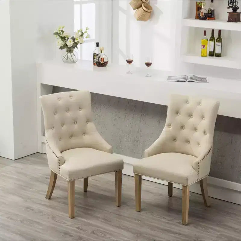 Roundhill Furniture Button Tufted Solid Wood Wingback Hostess Chairs with Nail Heads, Tan, Set of 2